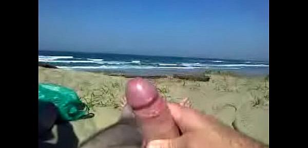  Hubby wanks on the beach